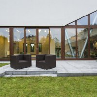 Ascetic villa patio with rattan chairs and grey floor